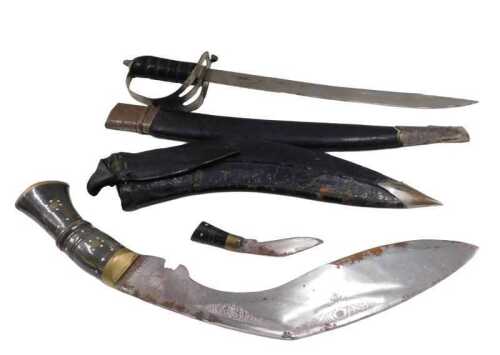 An early 20thC kukri, with etched curved blade, 44cm long, and a further short sabre with...