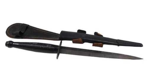 A post war FS style fighting knife, with blued straight double edge blade, blackened ribbed hilt,...