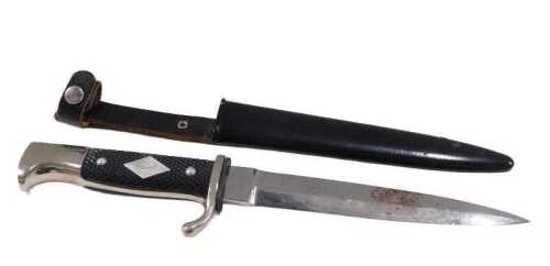 A Linder Messer Whitby dagger, bayonet type with shaped blade, turned handle and metal sheath,...