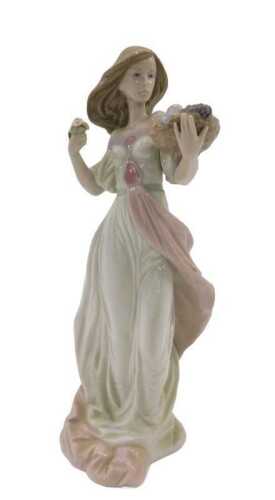 A Lladro figure group Autumn Romance, 31cm high, original cost &pound;265, boxed.