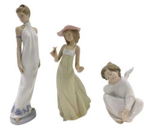 A Nao figure Angel Child, seated, 16cm high, and another. (1 boxed)
