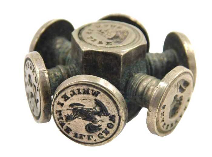 A Victorian wheel seal, with multiple wax seals, 3cm wide.