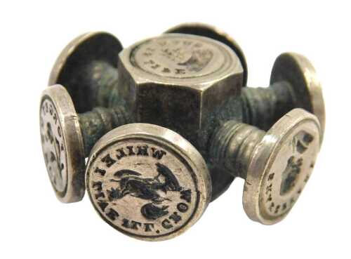 A Victorian wheel seal, with multiple wax seals, 3cm wide.