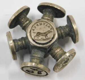 A Victorian wheel seal, with multiple wax seals, 3cm wide. - 3