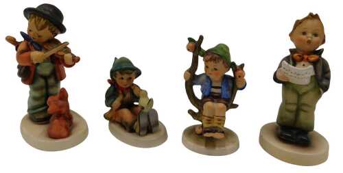Various Goebel Hummel figures, boy playing violin with dog, 14cm high, boy in tree, etc. (4)