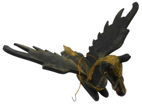 A 20thC Balinese wooden flying Pegasus or spirit chaser horse, with later stringing and gilt...