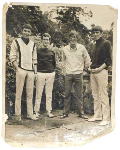 An original 1960s photograph of The Shadows, signed to include Hank Marvin, Bruce Welch, etc.,...