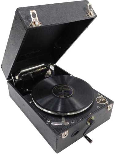 A mid-20thC Columbia picnic gramophone, in rectangular pressed black leather case, with...