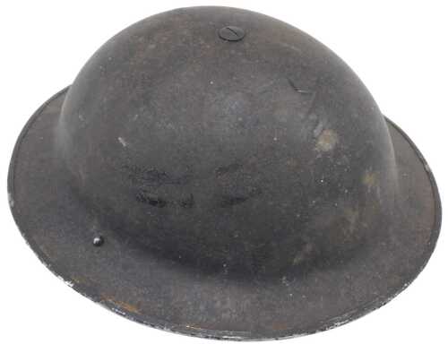 A 1939 dated British Army helmet, with original liner and sprung hessian chin strap.