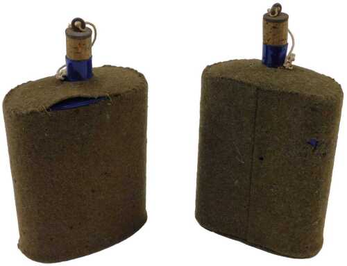 A mid 20thC military canteen, in blue with camouflage woollen outer material and cork stopper,...