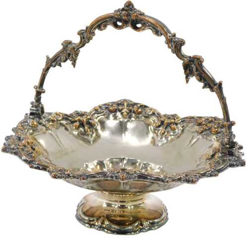 A 20thC Old Sheffield plate basket, by Walker & Hall, of naturalistic form, with berry and...