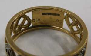 A 9ct gold eternity ring, of pierced heart design, half set with diamonds totalling 0.05ct, ring... - 2