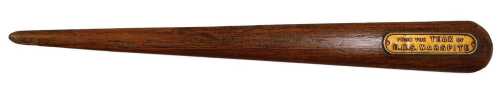 A teak letter opener, with metal plaque from the teak of HMS Warspite, 26cm long.