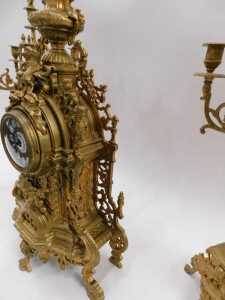 A 20thC gilt metal clock garniture, the 9cm diameter raised enamel Roman numeric dial housed in... - 3
