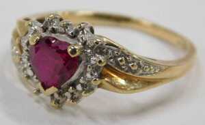 A 9ct gold cluster ring, the heart shaped garnet surrounded by white metal frame, on a yellow... - 2