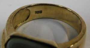 A 9ct gold jade and diamond dress ring, the oblong pale jade, with four tiny diamond set... - 3