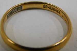 A 22ct gold wedding band, of plain design, 2mm width, Chester 1939, ring size O&frac12;, 2.8g. - 2