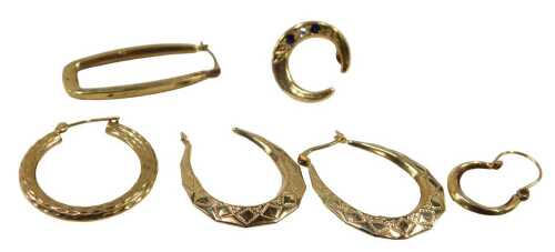 A pair of 9ct gold hoop earrings, three loose 9ct gold hoop earrings, and an unmarked sapphire...
