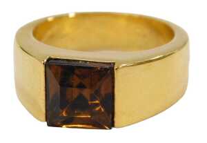 A modern finish gold plated dress ring, with citrine style paste stone, unmarked, ring size O.