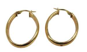 A pair of hoop earrings, each of oval plain design, with hinged clasp, yellow metal stamped 375,...