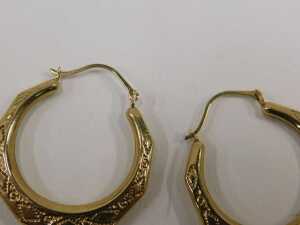 A pair of hoop earrings, each of hammered Eastern style design, yellow metal stamped 375, 2.5cm... - 2