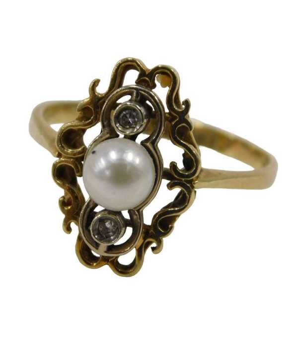 A pearl and diamond dress ring, the central pearl flanked by two tiny diamonds in a platinum Art...