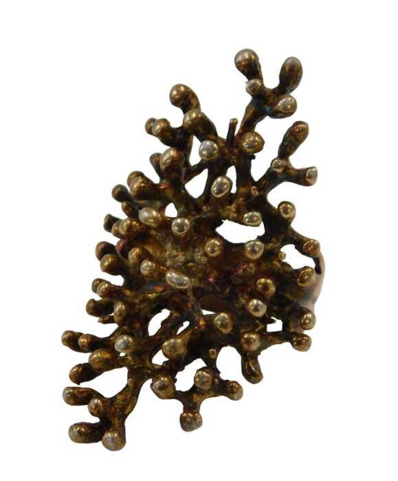 An abstract dress ring, formed as coral, with a gilded finish, white metal stamped 925, 4cm high,...