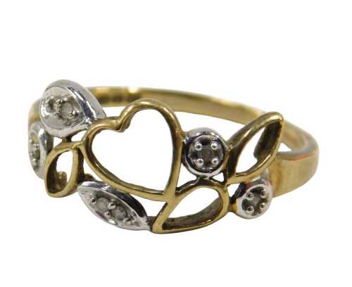 A 9ct gold dress ring, with heart and leaf pierced design, set with CZs in illusion setting,...