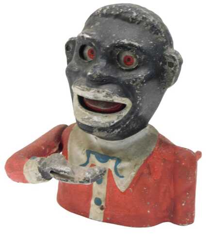 A 20thC articulated money box, 13cm high.