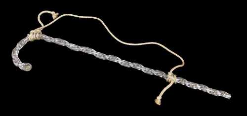 A 20thC barley twist crystal cane, believed to be Waterford, with later stringing, 78cm long.