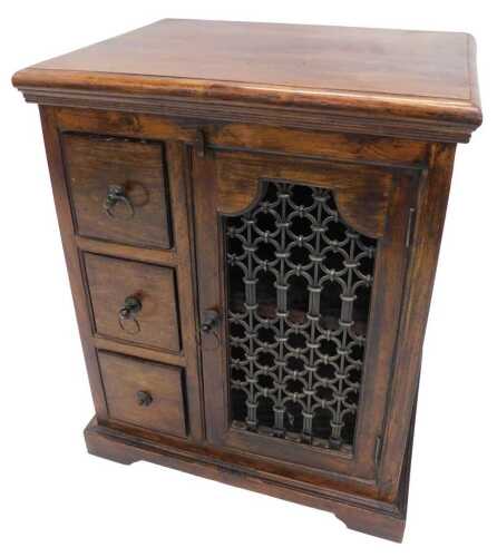 A hardwood side cabinet, with mesh fronted door, shelves and three spice drawers, 77cm high,...