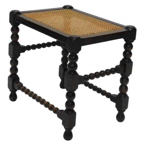 A 1920s oak bergere topped stool, with bobbin turned legs, 45cm high, 48cm wide, 35cm deep.