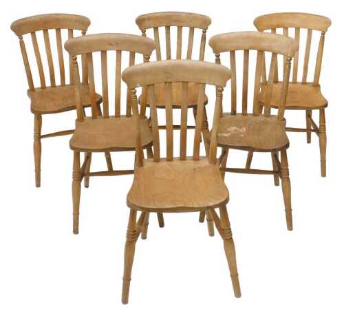 A set of six late 19thC beech lathe back dining chairs, with comb tops, turned legs, with a H...