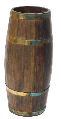 A 19thC oak coopered barrel, with brass banding, 65cm high, 23cm diameter.