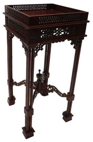 A 20thC Chippendale style kettle stand, the square top with a pierced gallery, on bamboo style...