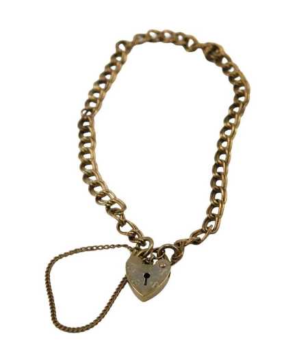 A 9ct gold bracelet, with double curb links, 18cm long, safety chain and heart shaped padlock, 2....