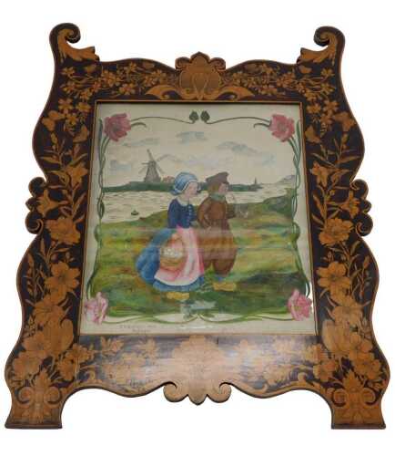 An early 20thC pokerwork frame, profusely decorated with butterflies, flower heads, and entwined...