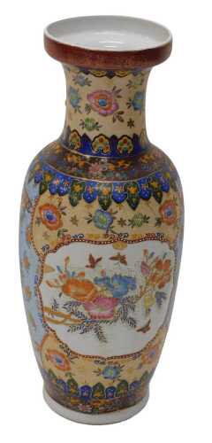A late 20thC Chinese pottery vase, hand painted with panels of flowers, birds and butterflies,...