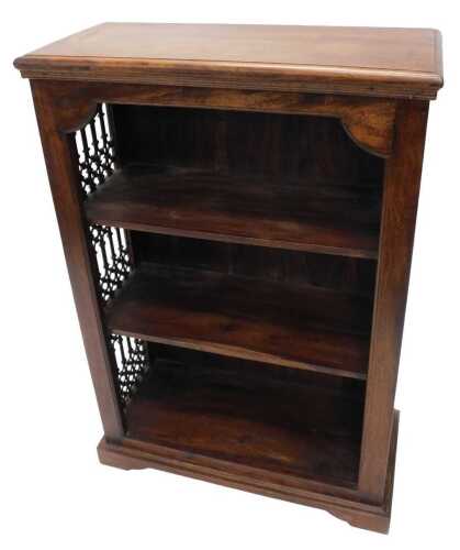 A late 20thC hardwood open cabinet, with three shelves flanked by metal meshwork sides, on...