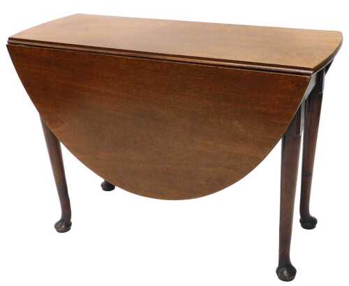 An early 19thC mahogany D end drop leaf table, on turned legs terminating in pad feet, when...