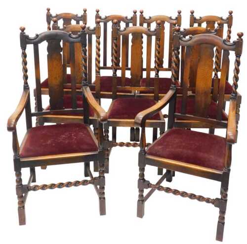 A set of nine (7+2) Edwardian oak dining chairs, each with vertical splats flanked by barley...