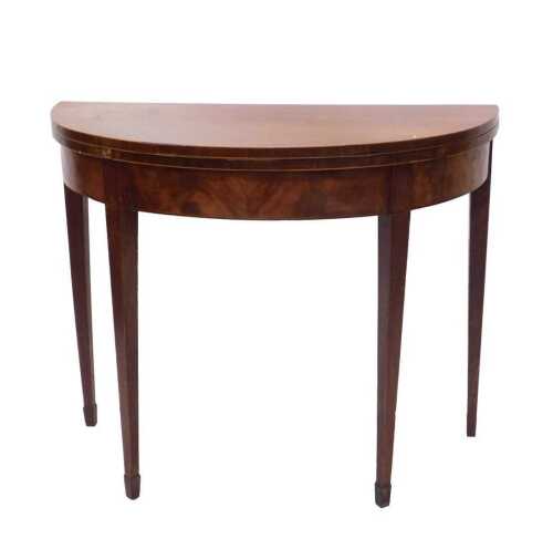 A 19thC mahogany D end card table, on square tapering legs terminating in spade feet, when...