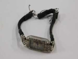 An Art Deco lady's cocktail watch, the case set with tiny diamonds, the dial with blue hands and... - 2