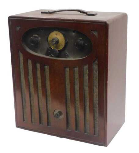 A mid 20thC walnut cased Melo-Set London radio, with front tuning knops and speaker, surmounted...