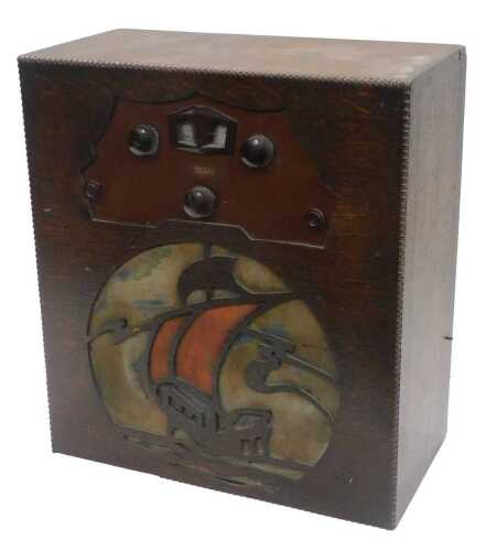 A mid 20thC oak cased Lissen radio, with front ship shaped speaker, 44cm high. WARNING! This lot...