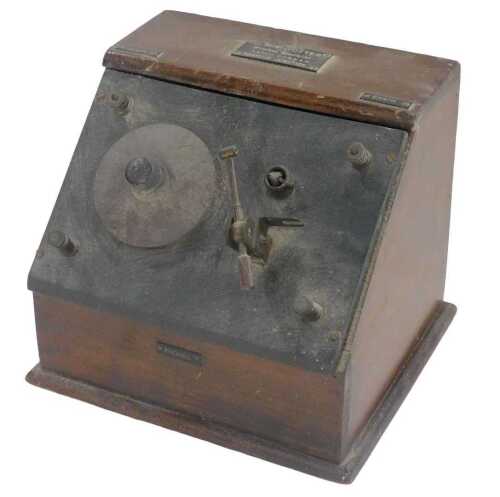 An early 20thC cased field telephone communications set, with CHP Nutter label, 16cm high.