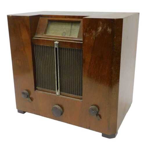 A mid-20thC GEC walnut cased radio, 46cm high. WARNING! This lot contains untested or unsafe...