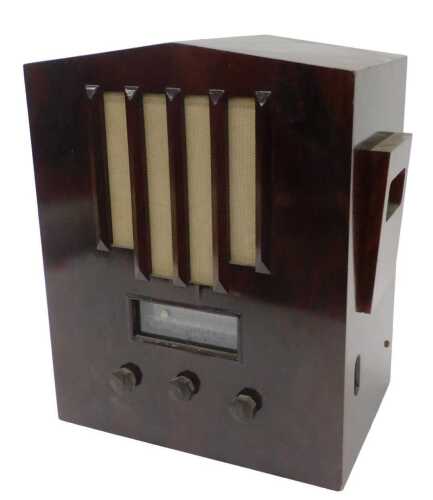 A mid 20thC Art Deco walnut cased radio, with front mesh speaker, 47cm high. WARNING! This lot...