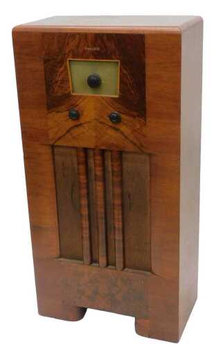 A mid 20thC Philco walnut cased freestanding radio, 225-260 volts AC, in freestanding cabinet,...