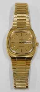 An Omega Seamaster automatic gent's wristwatch, with a gold coloured baton dial and date and day... - 2